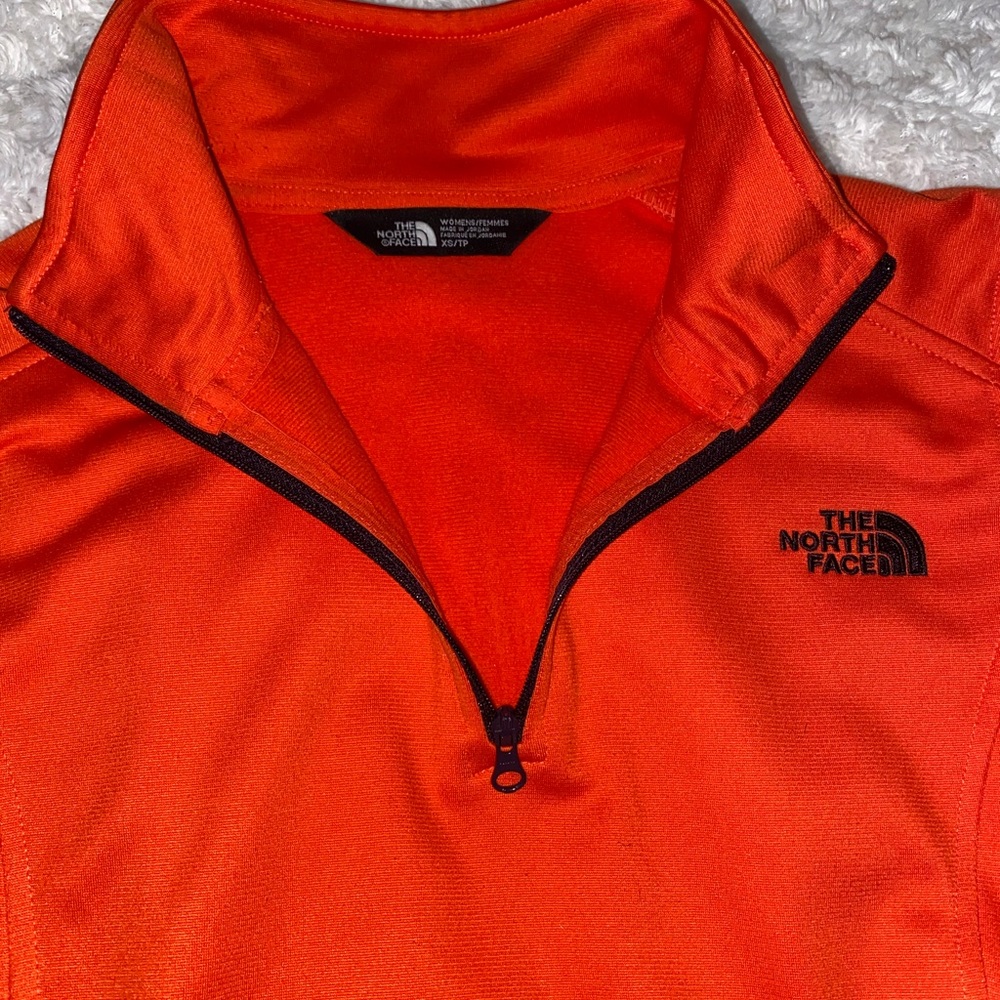 Women’s North Face Orange pull over jacket XS